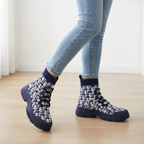 Chaussures bottines montantes contemporaines à semelle chunky, structure souple en maille et maintien renforcé, mises en valeur sur fond blanc e-commerce.